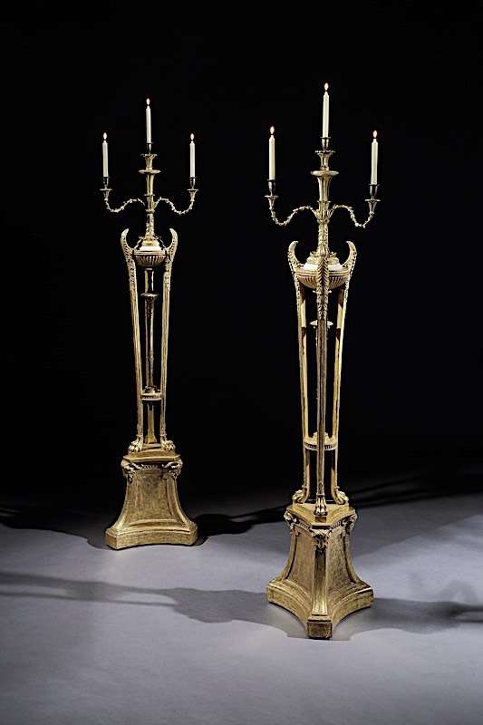 A PAIR OF GEORGE III TORCHÈRES ATTRIBUTED TO ROBERT ADAM AND THOMAS CHIPPENDALE